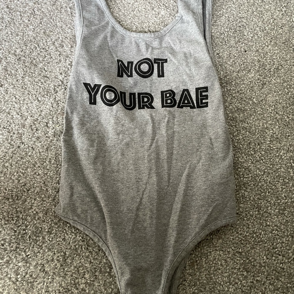 Grey body suit